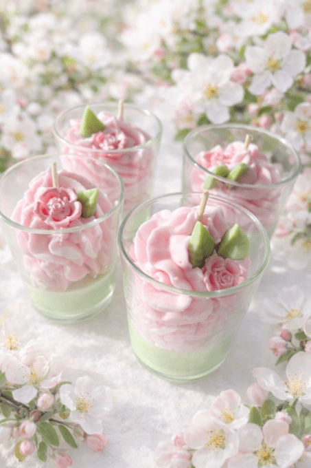 Bougie rose et fleur de pommier